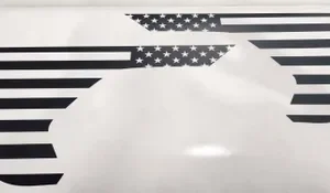 A close up of the american flag on a car