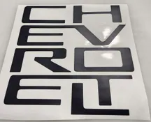 A picture of the word chevrolet on a sticker.